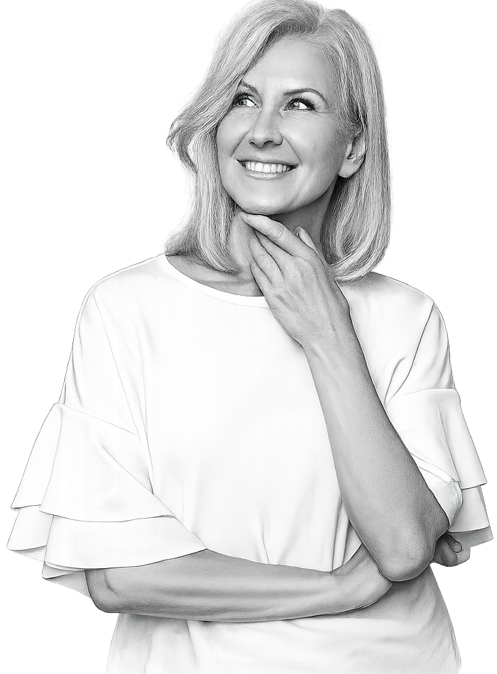 smiling woman with arms crossed looking on